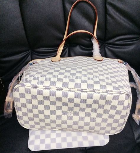 bag louis vuitton damier neverfull articles de voyage fake|false louis vuitton bags.